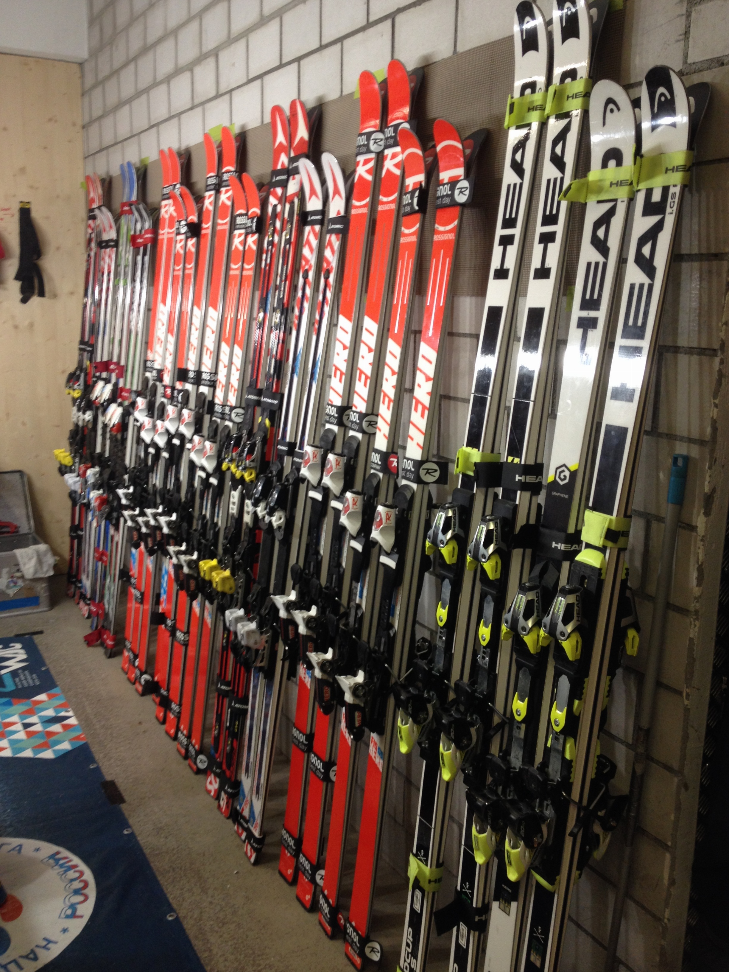 View of all the Super G and Giant Slalom skis used by the team. 