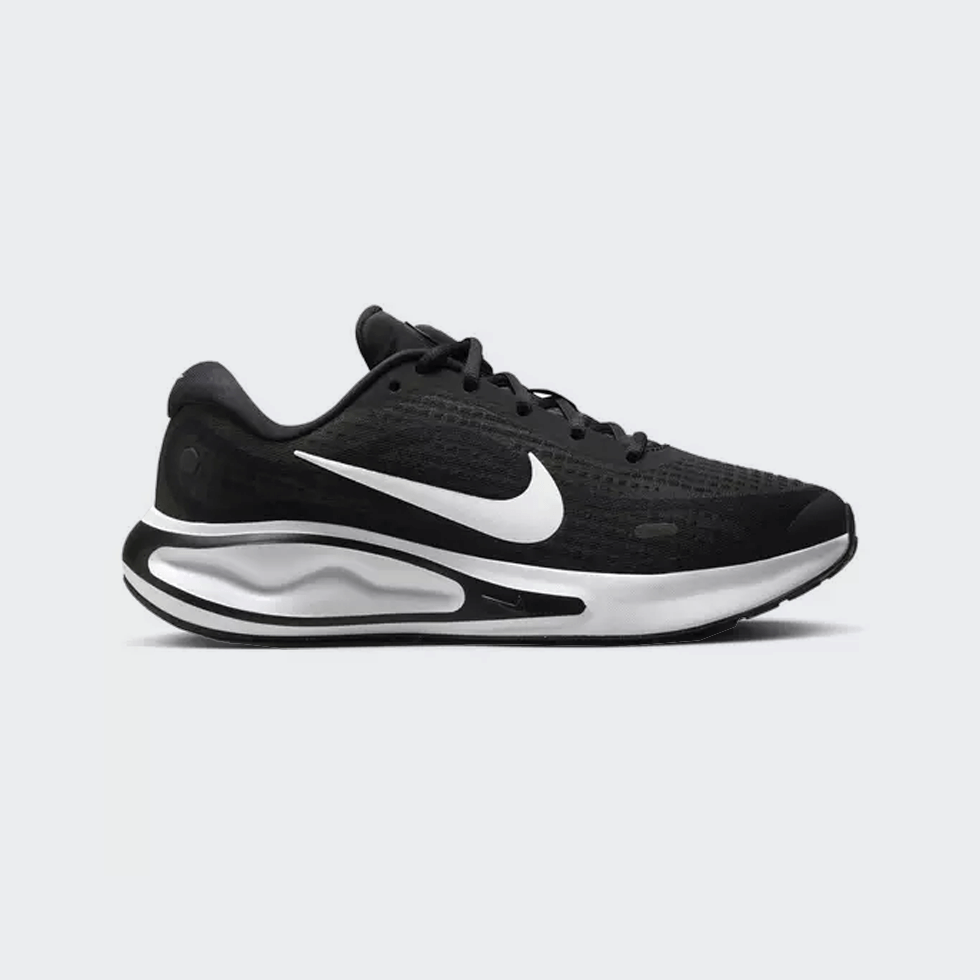 Black, white, and anthracite Nike Journey Run running shoe to book it to class.