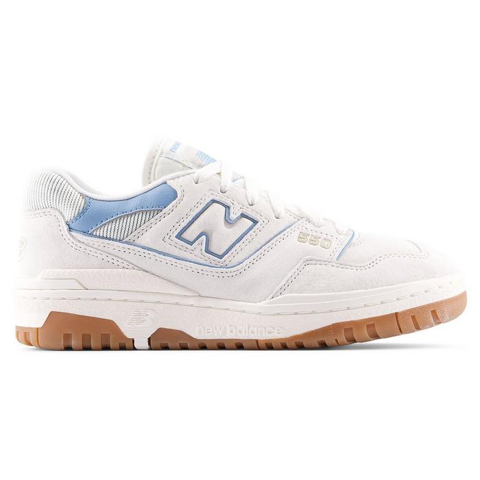 Slightly chunky New Balance sneaker in white with a layered upper design and subtle hints of light blue trim near the collar and around the "N" logo at the side. Contrast brown gum rubber outsole. Subtle tonal "550" branding towards the side-front. White laces at the top.
